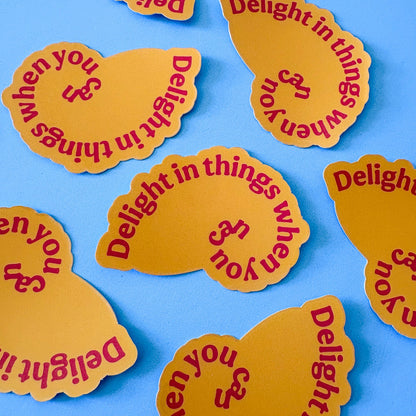 Yellow stickers with red text on a blue background