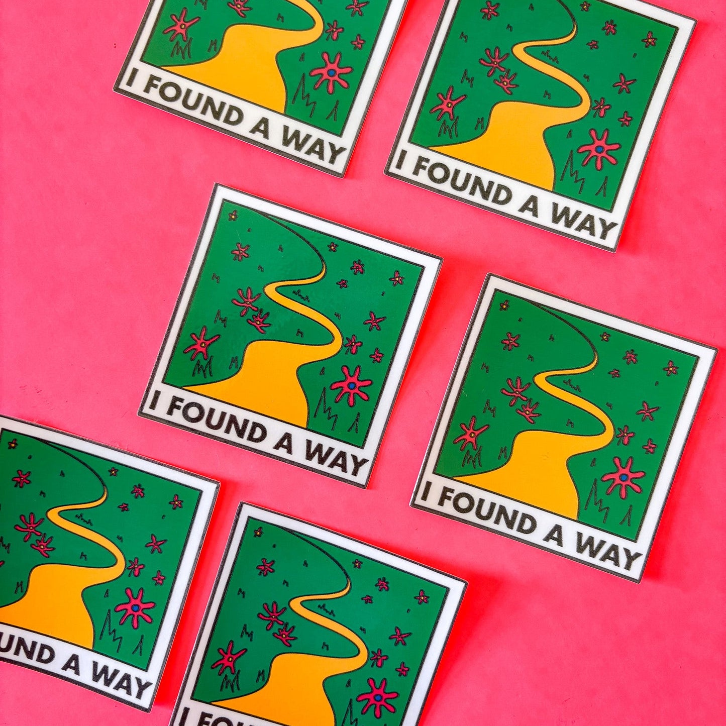Five green and yellow stickers with a road design and 'I Found A Way' text on a pink background.