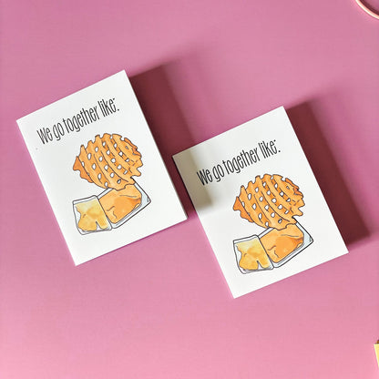 Two greeting cards with waffle fry and sauce illustrations on a pink background.