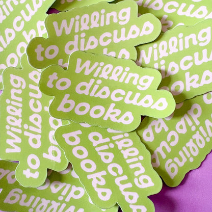 Green stickers with white text on a purple background